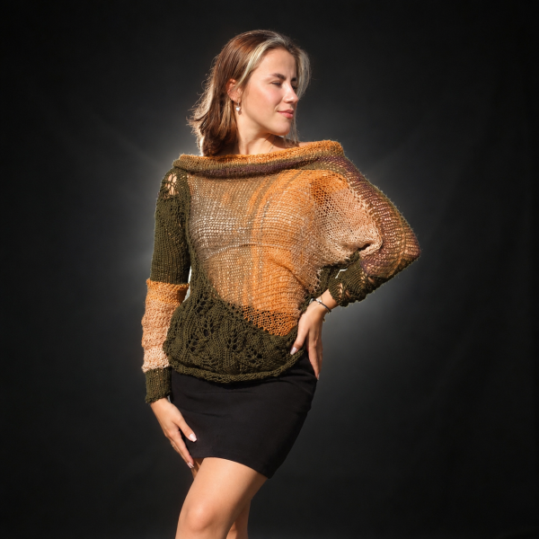 Amber Caprice by the riverside, styled with a black skirt in warm evening light.