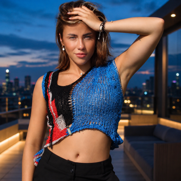Asymmetric summer knit top styled for an evening in the city