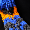 Already Taken details (2) Close-up of blue, black and orange knitted textures