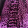 Graceful Exit details (1) Close-up of the deep purple handmade knit texture